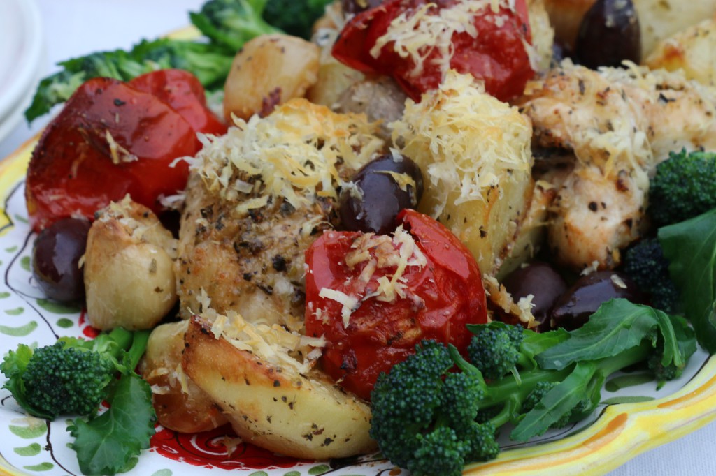 Parmesan baked chicken with potatoes, tomatoes