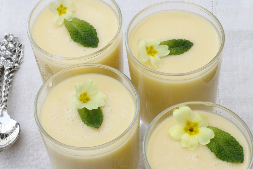 Lemon possets with honey, mint and primrose