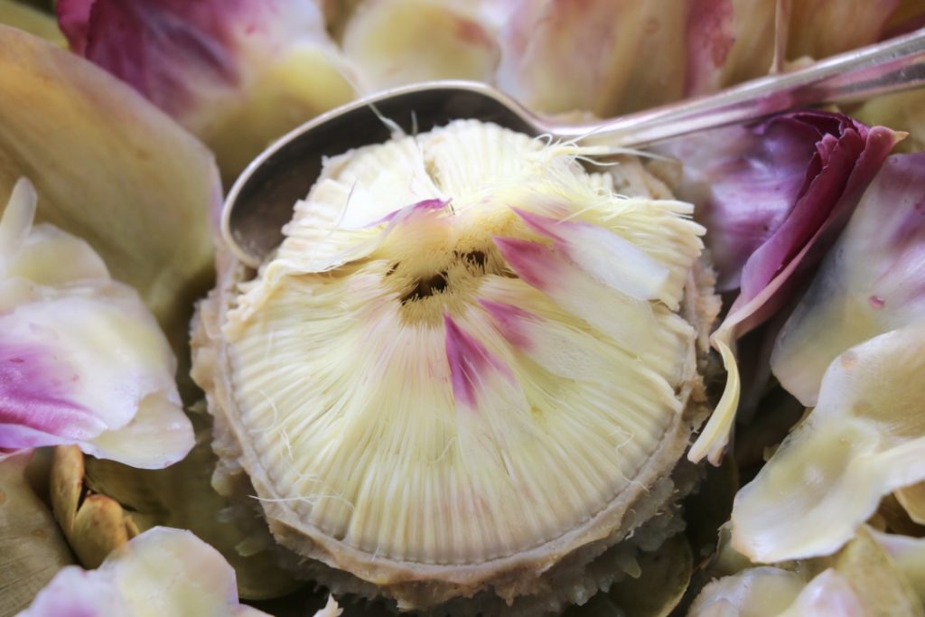 The choke of the artichoke Crumbs on the Table